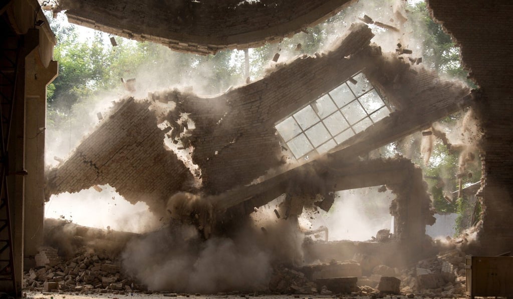 Walls of Ai’s studio collapsing during demolition on Saturday. Photo: AP