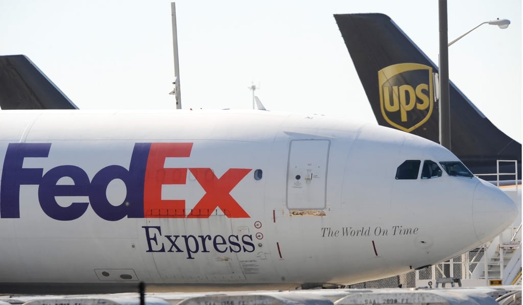 FedEx and UPS cargo planes sit on the tarmac at Hartsfield-Jackson Atlanta International Airport. Photo: AP