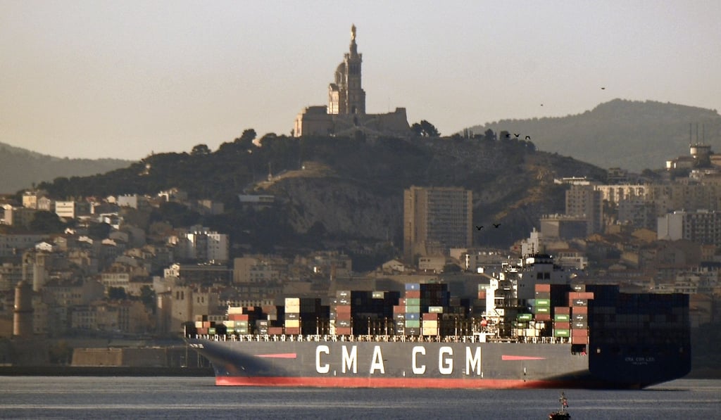 A container ship operated by the French CMA CGM shipping company is moored at the port of Marseille. The world's third largest shipping container group, t CMA CGM, has decided to withdraw from Iran over the threat of US sanctions. Photo: Agence France-Presse