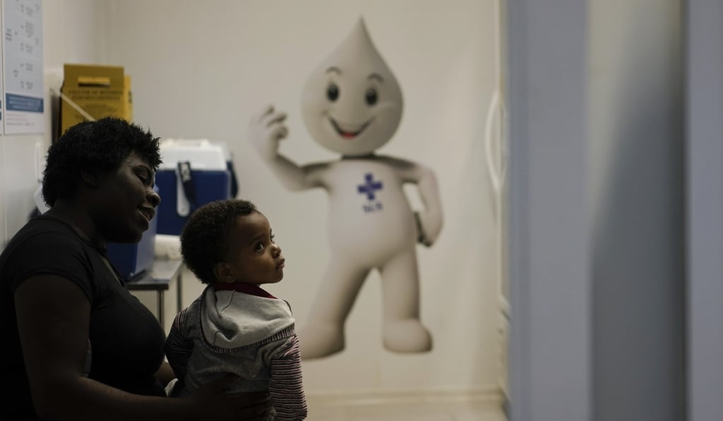 Pedro, 1, after receiving hs vaccines against measles and polio in Rio de Janeiro on Monday. Photo: AP