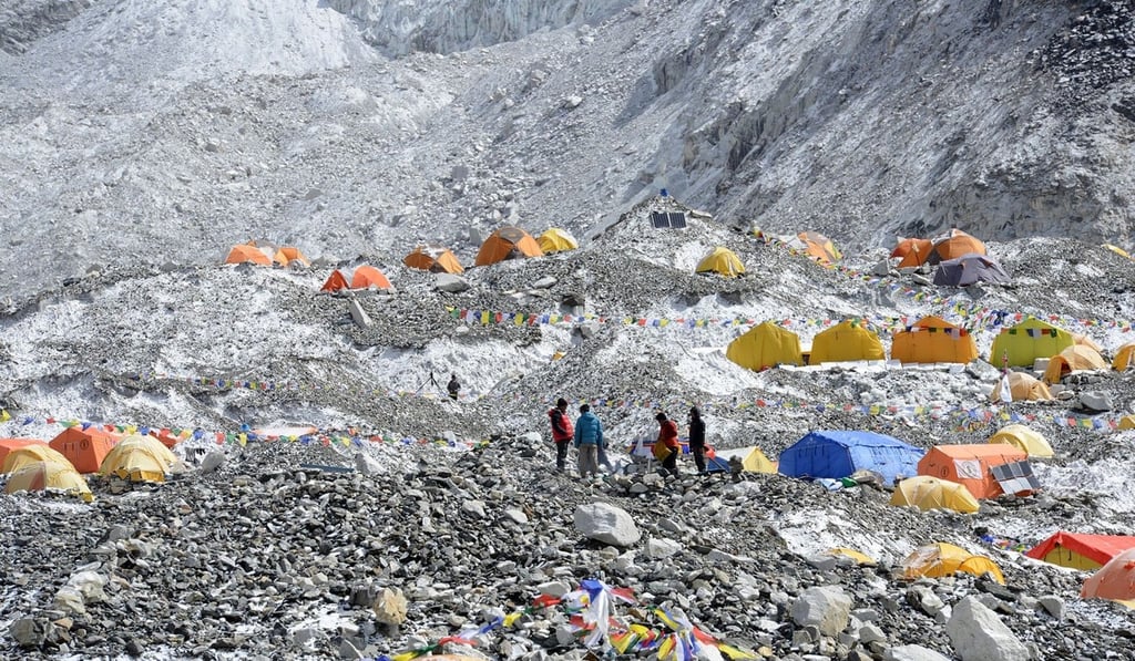 In this photograph taken on April 25, 2018, trekkers and porters gather at Everest Base Camp. Photo: Agence France-Presse