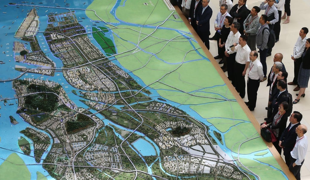 Former Hong Kong chief executive Leung Chun-ying led a city delegation to the Guangzhou Nansha Economic and Social Development Exhibition Hall to discuss the Greater Bay Area. Photo: Dickson Lee Former Hong Kong chief executive Leung Chun-ying led a city delegation to the Guangzhou Nansha Economic and Social Development Exhibition Hall to discuss the Greater Bay Area. Photo: Dickson Lee