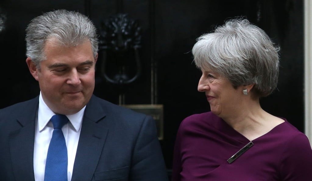 Conservative Party Chairman Brandon Lewis with British Prime Minister Theresa May in January. They have both called upon Johnson to apologise for his remarks. Photo: AFP