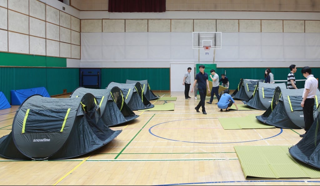 An air-conditioned shelter set up in a gymnasium in Seoul. Photo: EPA An air-conditioned shelter set up in a gymnasium in Seoul. Photo: EPA
