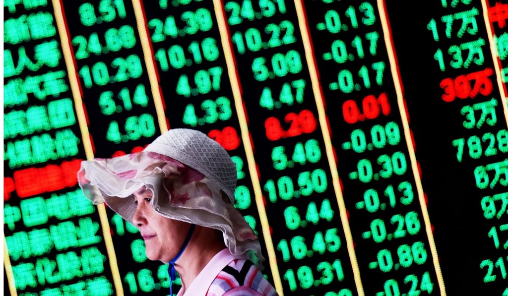 A screen shows stock market figures at a securities company in Hangzhou in Zhejiang province, mainland China. Photo: AFP