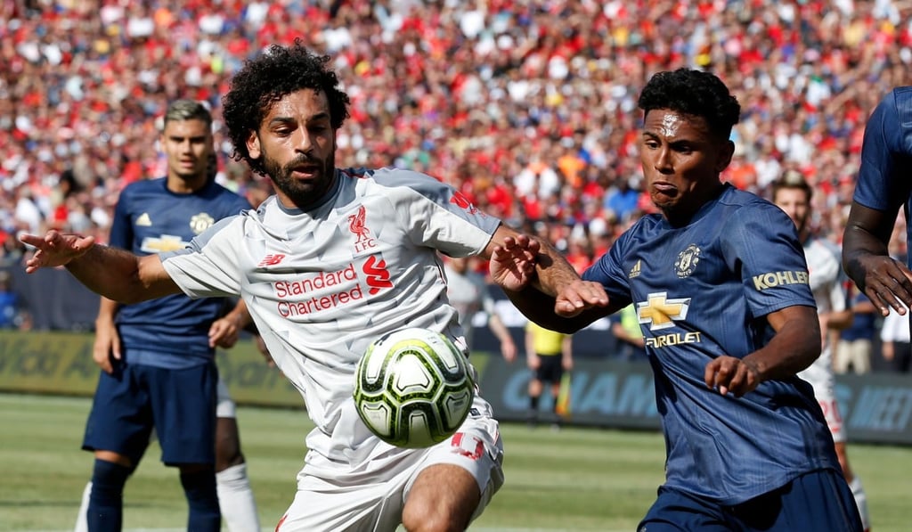 Mohamed Salah vies for the ball with Manchester United’s Demitri Mitchell during their International Champions Cup friendly at Michigan Stadium. Photo: AFP Mohamed Salah vies for the ball with Manchester United’s Demitri Mitchell during their International Champions Cup friendly at Michigan Stadium. Photo: AFP