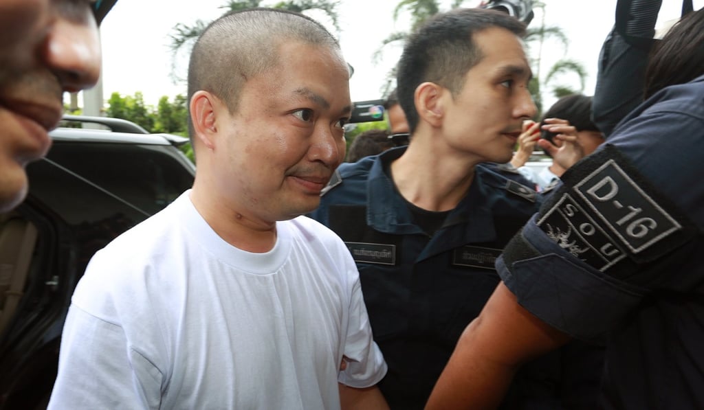 Former Thai Buddhist monk Wiraphon Sukphon, or Nen Kham, arrives at court in Bangkok. Photo: EPA