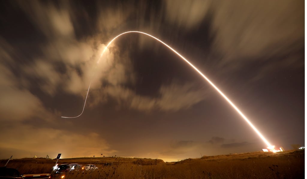 The Israeli Iron Dome anti-missile system fires an interceptor missile towards rockets launched from Gaza near the southern city of Sderot on Thursday. Photo: Reuters