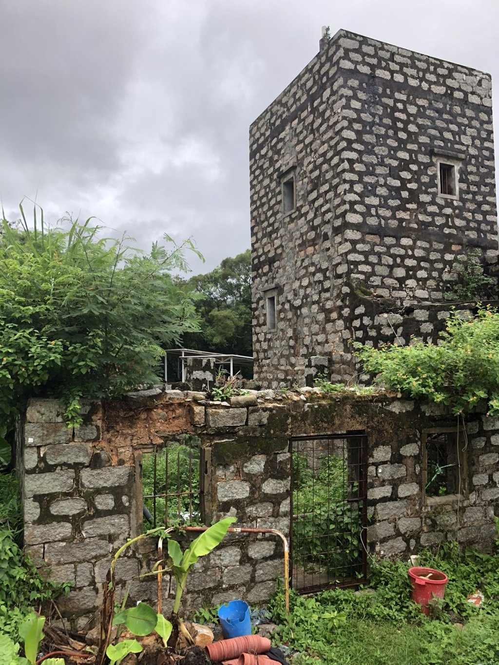 Blocks have fallen off a wall and the buildings have cracks, the Yuen family says. Photo: Yuen family