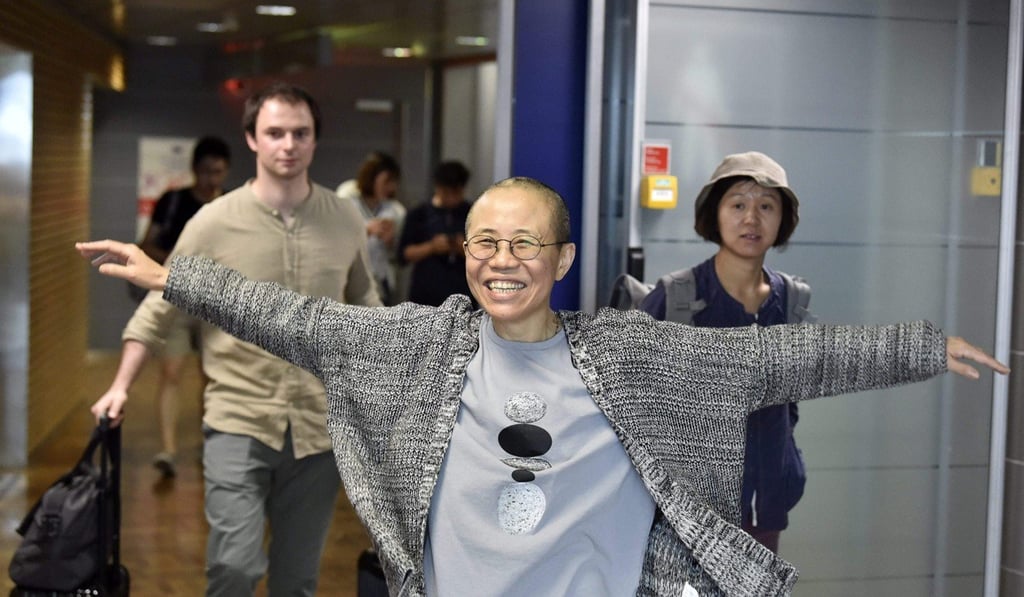 Liu Xia arrives at the Helsinki International Airport in Finland on July 10 on her way to her final destination of Berlin. Photo: AFP