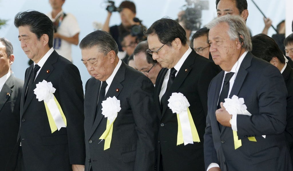 Japanese Prime Minister Shinzo Abe, left, with Guterres commemorating the bombing of Nagasaki this month. Photo: Kyodo Japanese Prime Minister Shinzo Abe, left, with Guterres commemorating the bombing of Nagasaki this month. Photo: Kyodo