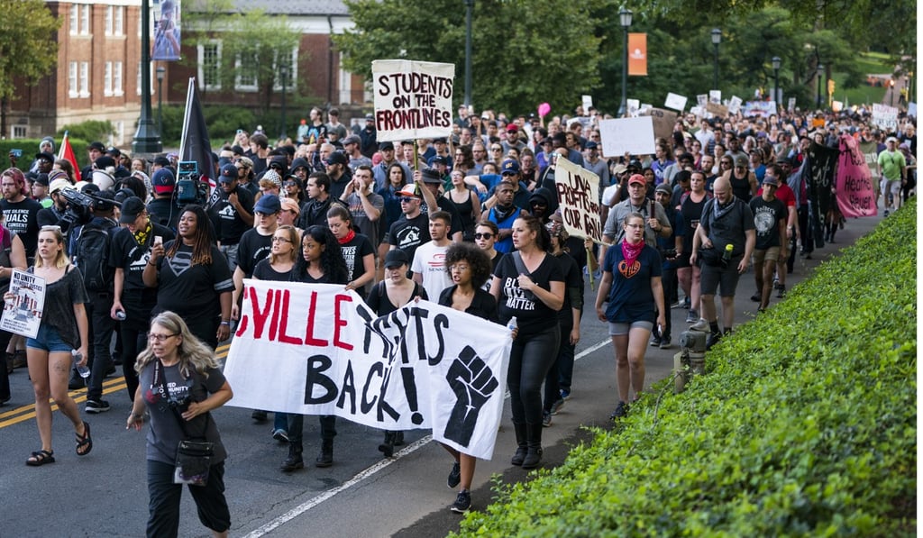 Students from the University of Virginia holding their ‘Rally for Justice’. Photo: EPA