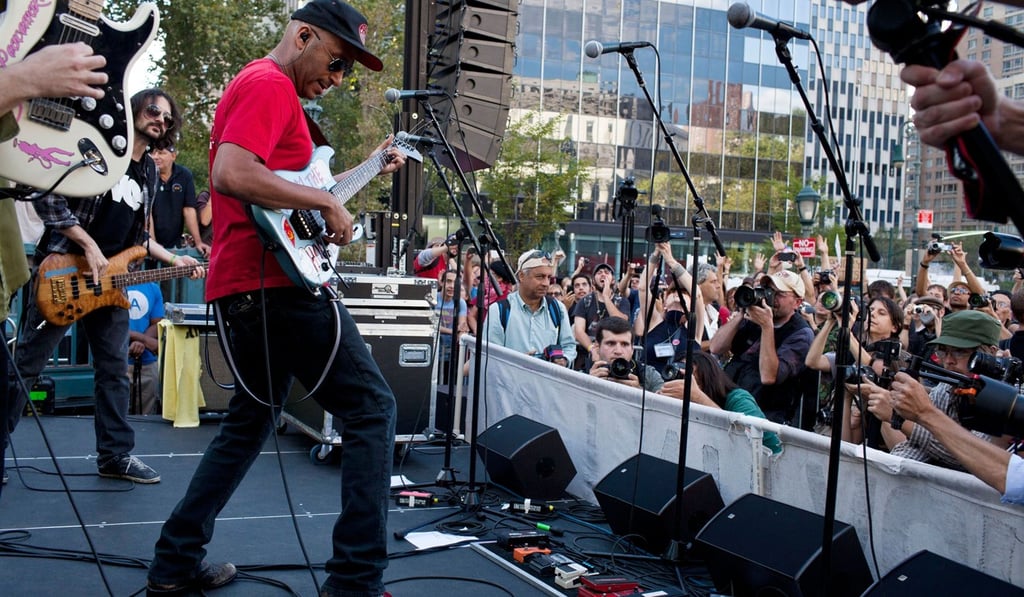 Tom Morello, former Rage Against the Machine lead singer, performs at a 2012 New York protest concert – 12 years after the group filmed a music video in the city on the steps of Wall Street’s New York Stock Exchange. Photo: AFP