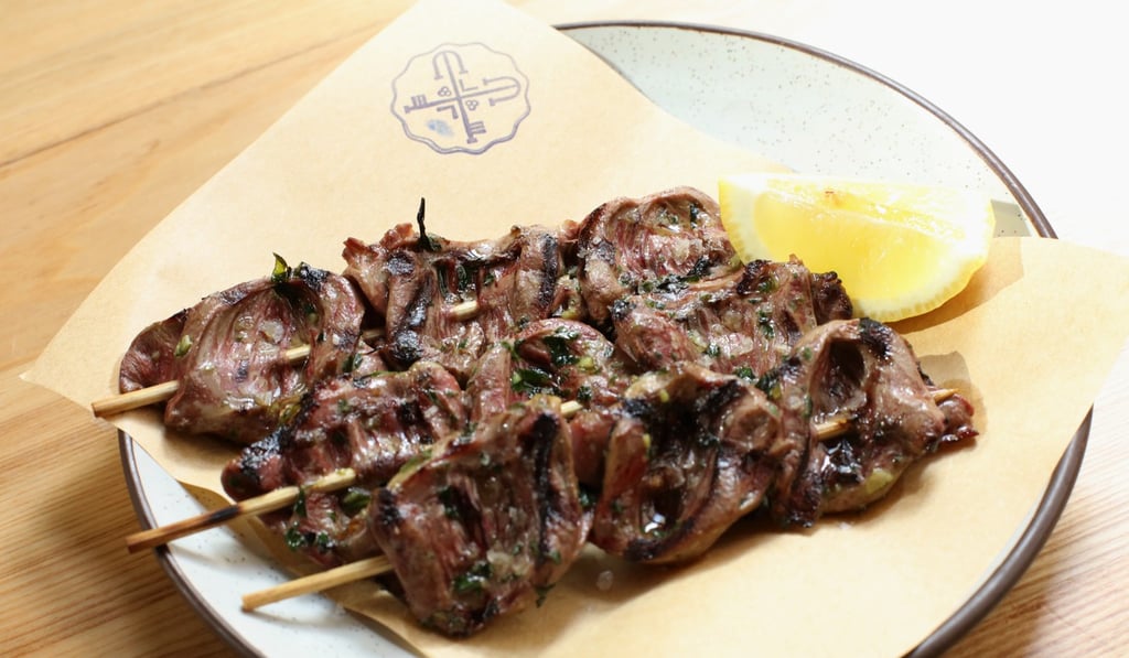 Duck heart kebabs with parsley vinaigrette. Photo: Felix Wong