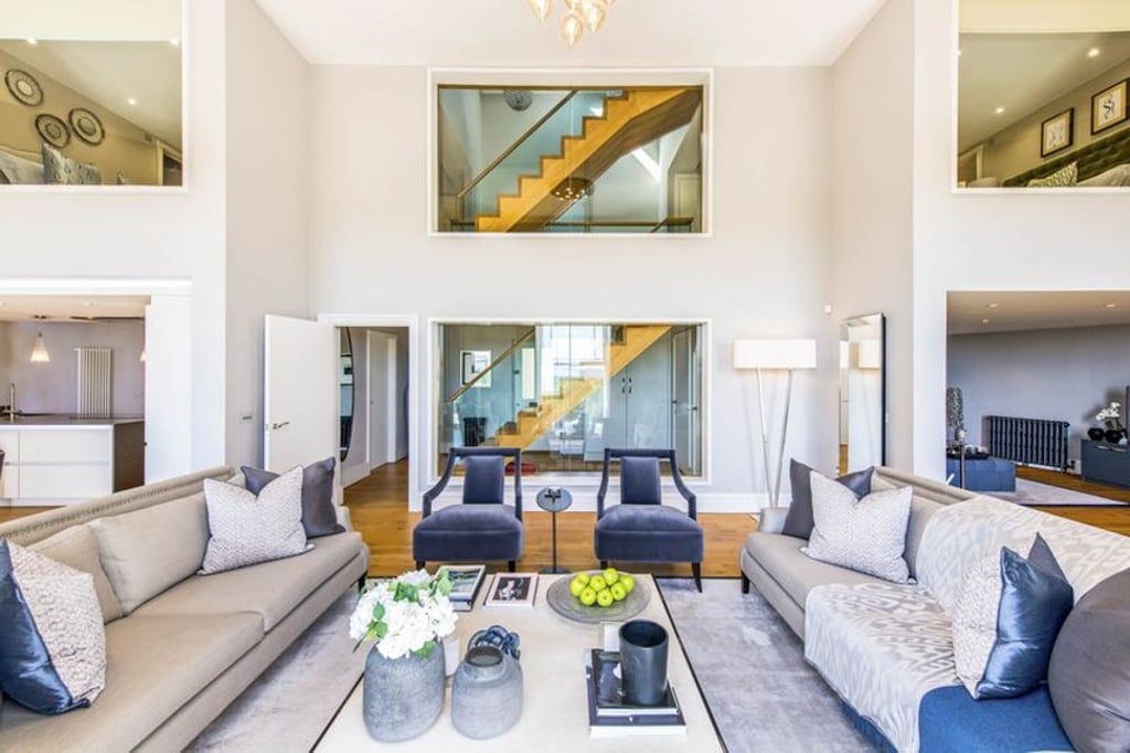The three-bedroom, three-bathroom, 2,285-square-foot apartment is arranged over three floors. Photo: Savills