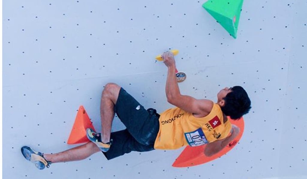 Lam Hei-yeung bouldering. At the Asian Games he is taking part in the speed relay. Photo: Catch萌