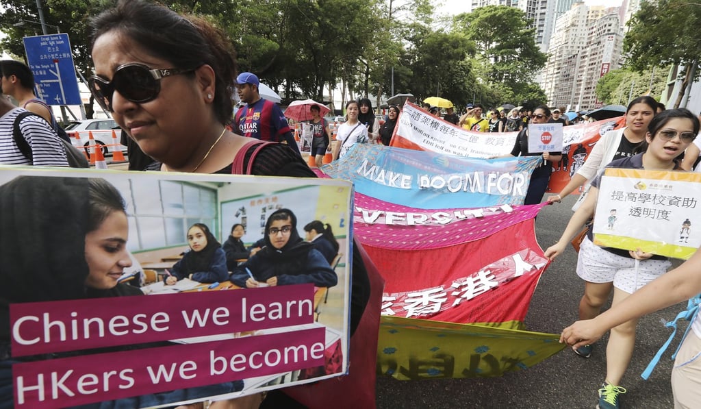 Residents during the July 1st march in Causeway Bay. Photo: Felix Wong Residents during the July 1st march in Causeway Bay. Photo: Felix Wong
