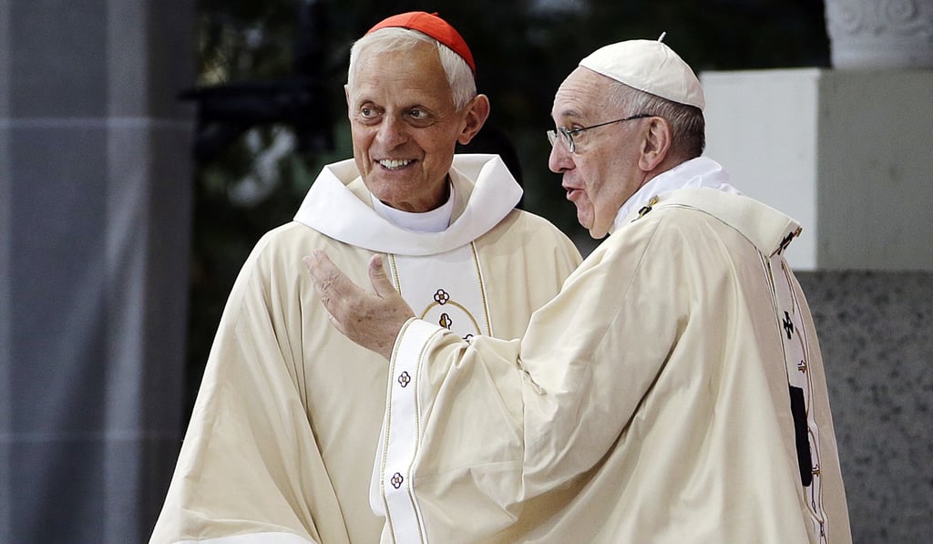 Cardinal Donald Wuerl looks toward the crowd with Pope Francis following a mass in Washington in 2015. The grand jury report released Tuesday faulted Wuerl for what it said was his part in the concealment of clergy sexual abuse. Photo: AP Cardinal Donald Wuerl looks toward the crowd with Pope Francis following a mass in Washington in 2015. The grand jury report released Tuesday faulted Wuerl for what it said was his part in the concealment of clergy sexual abuse. Photo: AP
