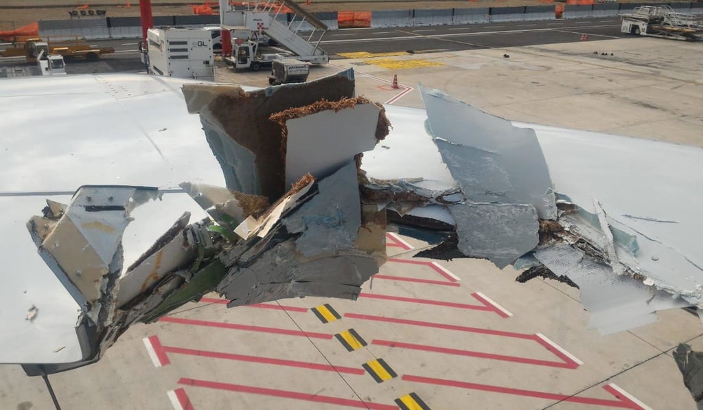 A photo of the damaged wing of the Cathay Pacific Boeing 777, after it hit a pole while being towed. Photo: Handout
