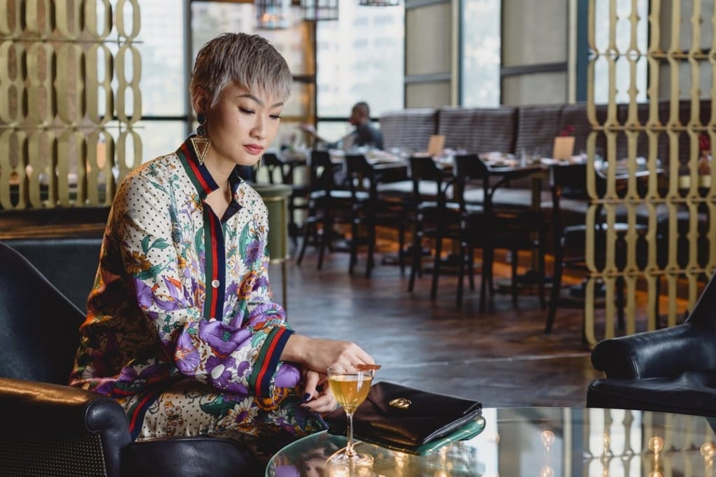 The editor-in-chief of fashion website Buro 24/7 Singapore relaxes at 1880. Photo: Arabelle Zhuang. Make-up: Rick Yang