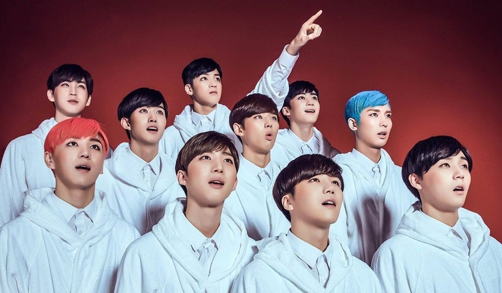 K-pop group Pentagon, in which E’Dawn sings. K-pop group Pentagon, in which E’Dawn sings.