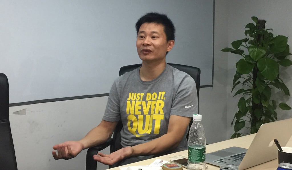 Chen Benfeng, founder and chief executive of Redcore, talks about the company's web browser at its offices in Beijing. Photo: SCMP