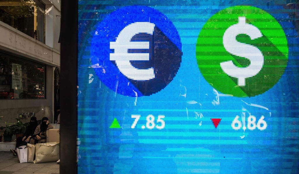 A billboard in Istanbul gives currency updates as troubles hit the Turkish lira. Photo: AFP