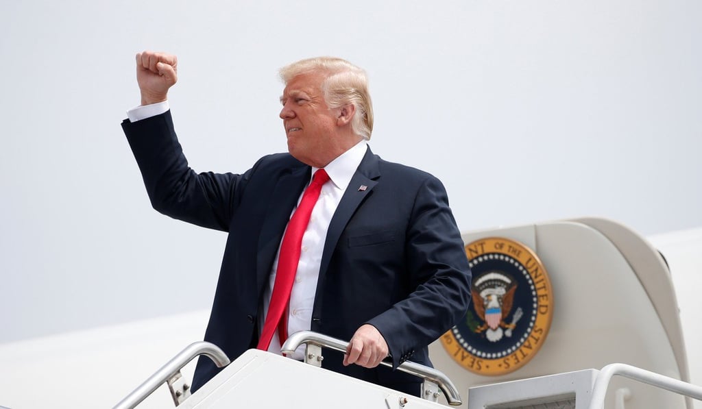 President Trump arriving for campaign fundraising events in Southampton, New York, on Friday. Earlier, he told reporters he had received a ‘tremendous response’ since revoking Brennan’s clearance. Photo: Reuters