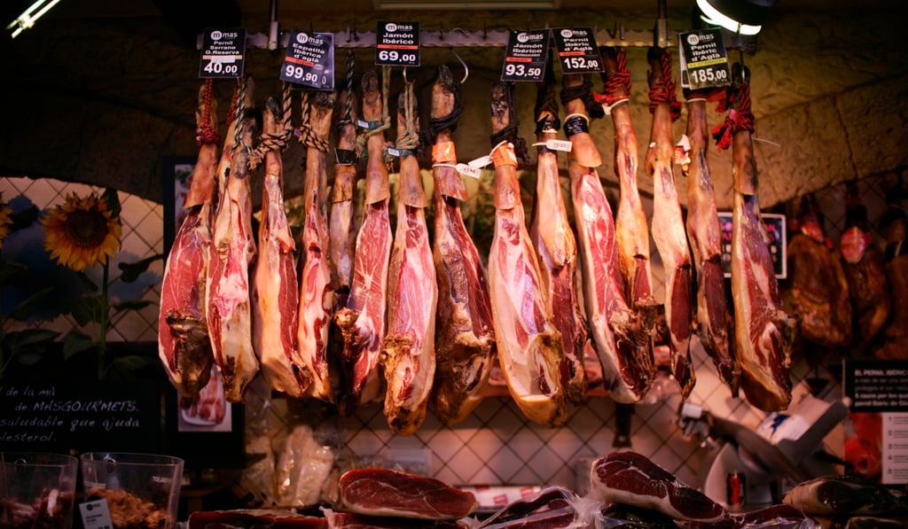 Pork on offer at Market la Boqueria in Barcelona, Spain. Photo: Alamy Stock Photo