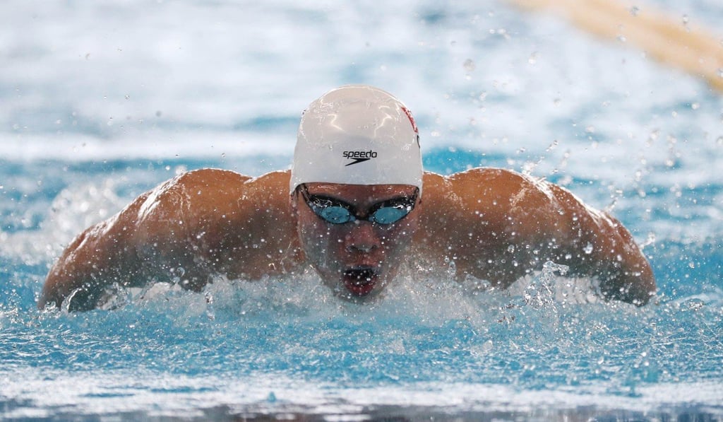 Li Zhuhao of China competes in the butterfly heats. Photo: Reuters