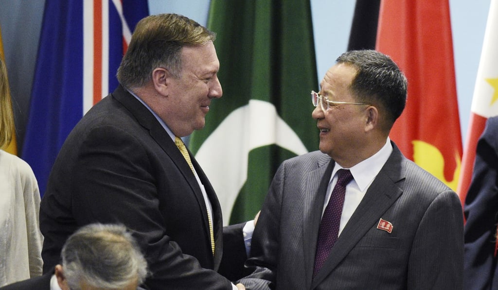 US Secretary of State Mike Pompeo (left) greets North Korean Foreign Minister Ri Yong-ho at an Asean meeting in Singapore on August 4. Photo: AP US Secretary of State Mike Pompeo (left) greets North Korean Foreign Minister Ri Yong-ho at an Asean meeting in Singapore on August 4. Photo: AP