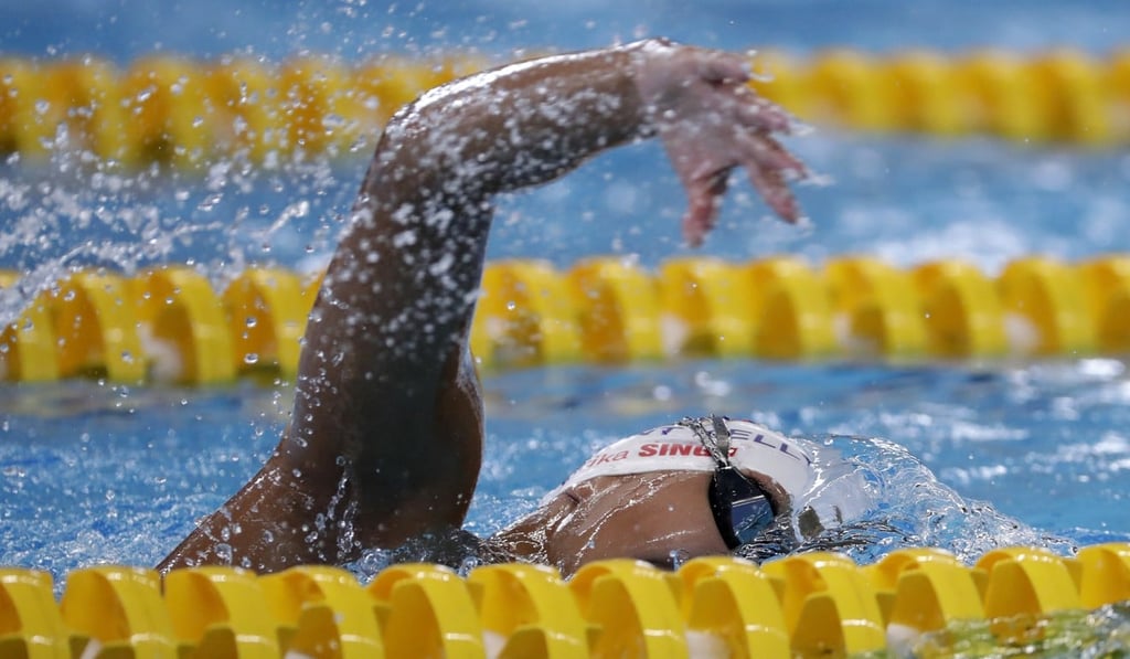Nepal's Gaurika Singh swims during a warm-up session at the 18th Asian Games in Jakarta. Photo: AP