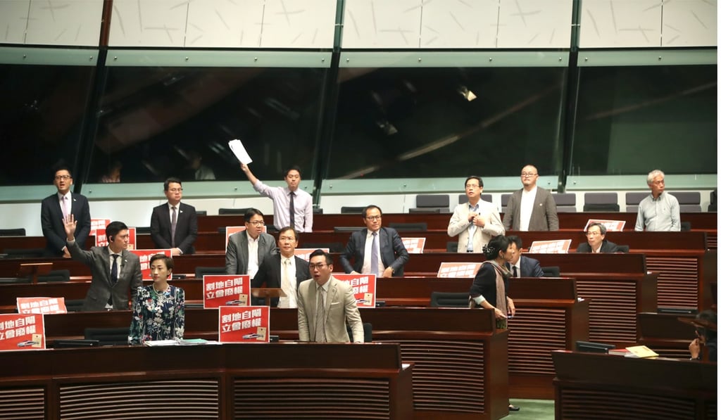 Pan-democrat lawmakers at the debate on the co-location plan. Photo: Edward Wong