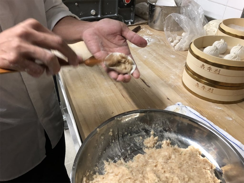 Put the filling into the dough. Put the filling into the dough.