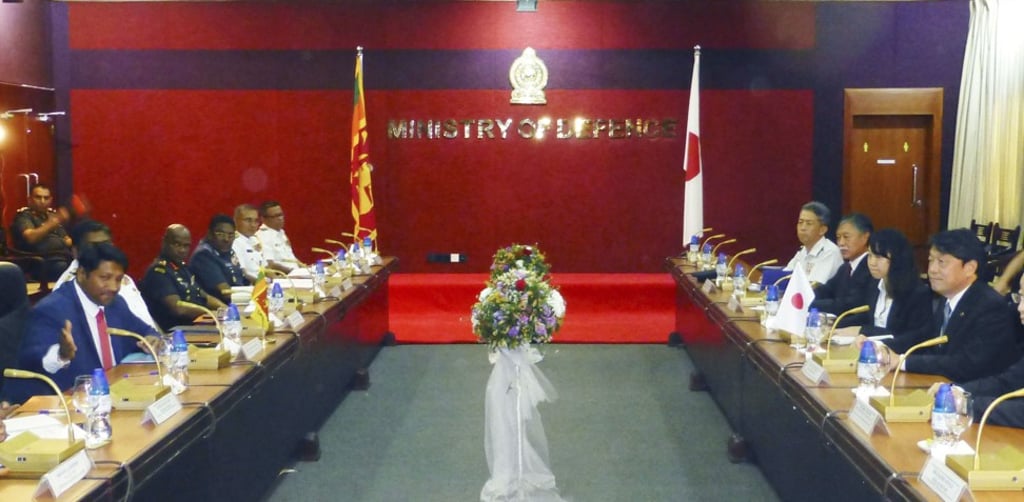 Sri Lankan Defence Minister Ruwan Wijewardene (far left) and Onodera (far R) meeting in Colombo. Photo: Kyodo