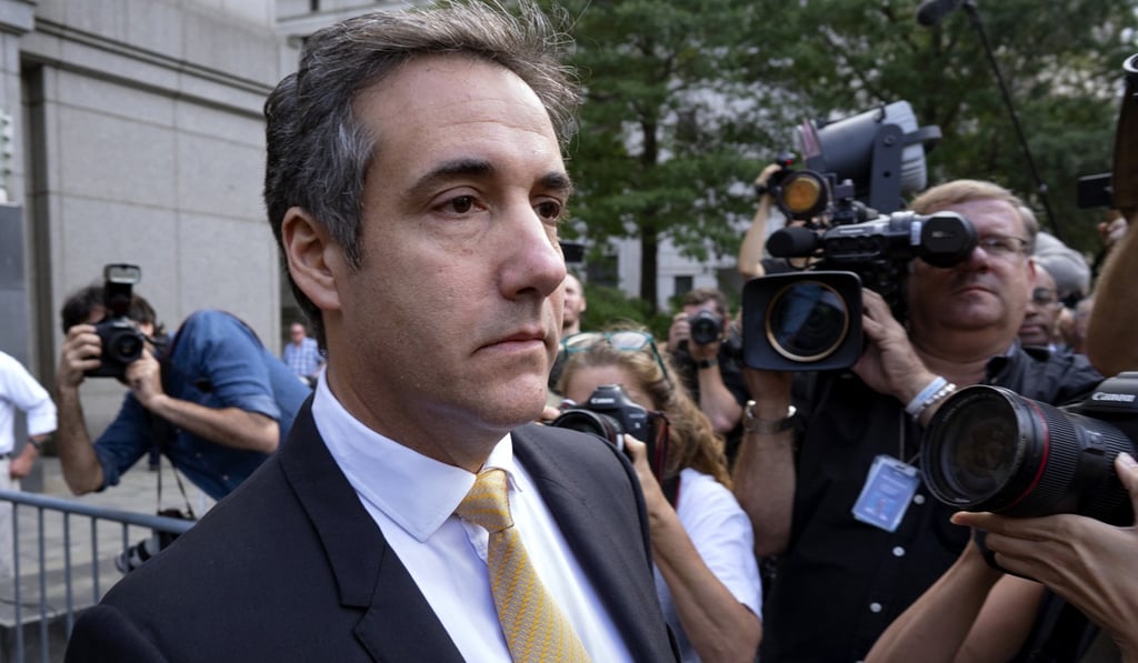 Michael Cohen, former personal lawyer to President Donald Trump, leaves federal court after reaching a plea agreement in New York on Tuesday. Photo: AP