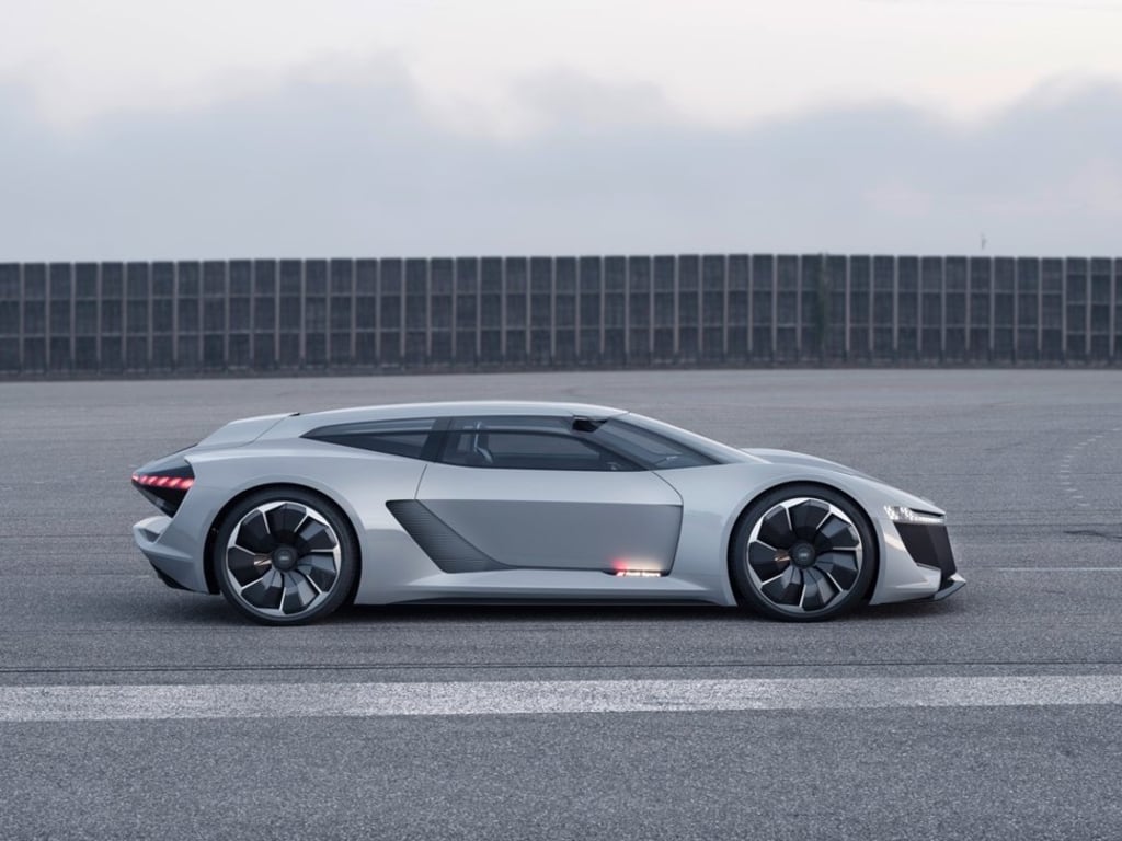 Audi’s new PB18 e-tron concept sports car was unveiled on Thursday during the three-day Rolex Monterey Motorsports Reunion Reception in Pebble Beach, California. Audi’s new PB18 e-tron concept sports car was unveiled on Thursday during the three-day Rolex Monterey Motorsports Reunion Reception in Pebble Beach, California.