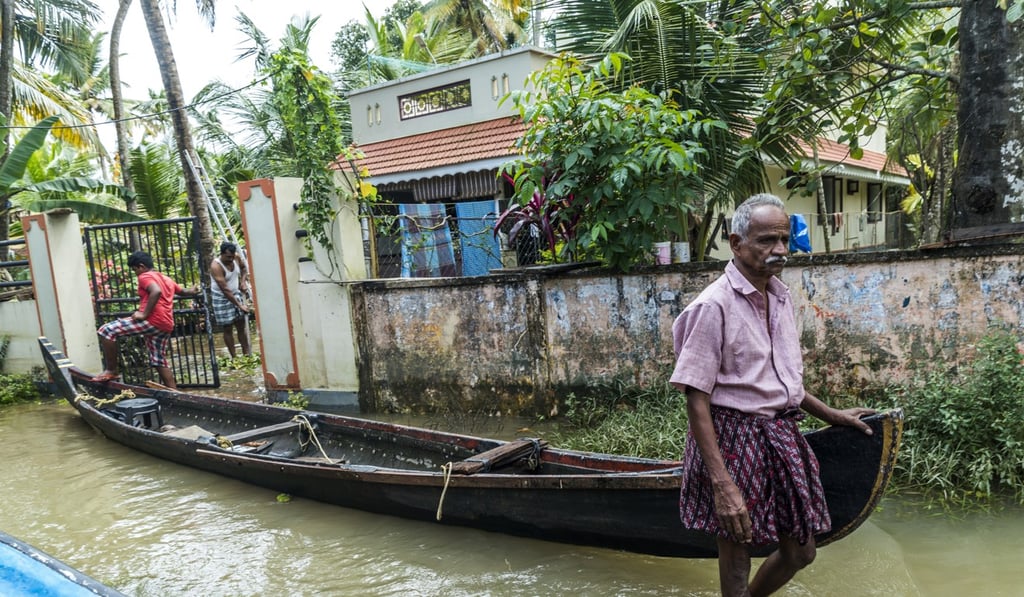 Floodwaters in a village in Alappuzha district. Photo: Bloomberg