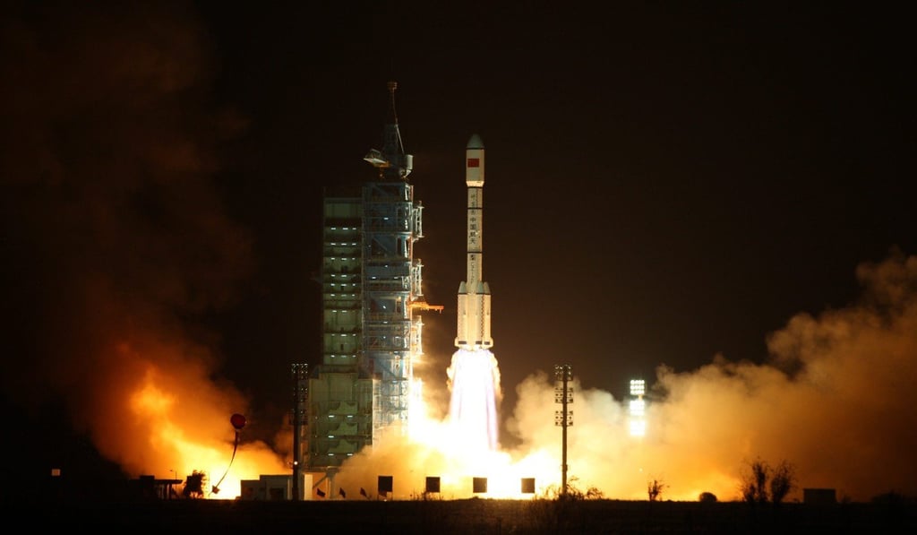 Carried by the Long March II-F T1 rocket, Tiangong-1 is launched into orbit from Jiuquan Satellite Launch Centre in northwest China in September 2011. Photo: EPA Carried by the Long March II-F T1 rocket, Tiangong-1 is launched into orbit from Jiuquan Satellite Launch Centre in northwest China in September 2011. Photo: EPA