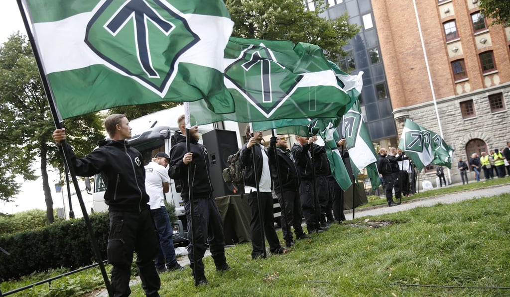 Supporters of the neo-Nazi Nordic Resistance Movement. Photo: EPA Supporters of the neo-Nazi Nordic Resistance Movement. Photo: EPA