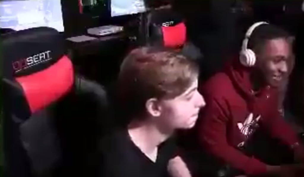 A red laser dot appears on the chest of video game player Eli Clayton (right) seconds before shots are fired. Clayton was reportedly killed. Photo: Twitter A red laser dot appears on the chest of video game player Eli Clayton (right) seconds before shots are fired. Clayton was reportedly killed. Photo: Twitter