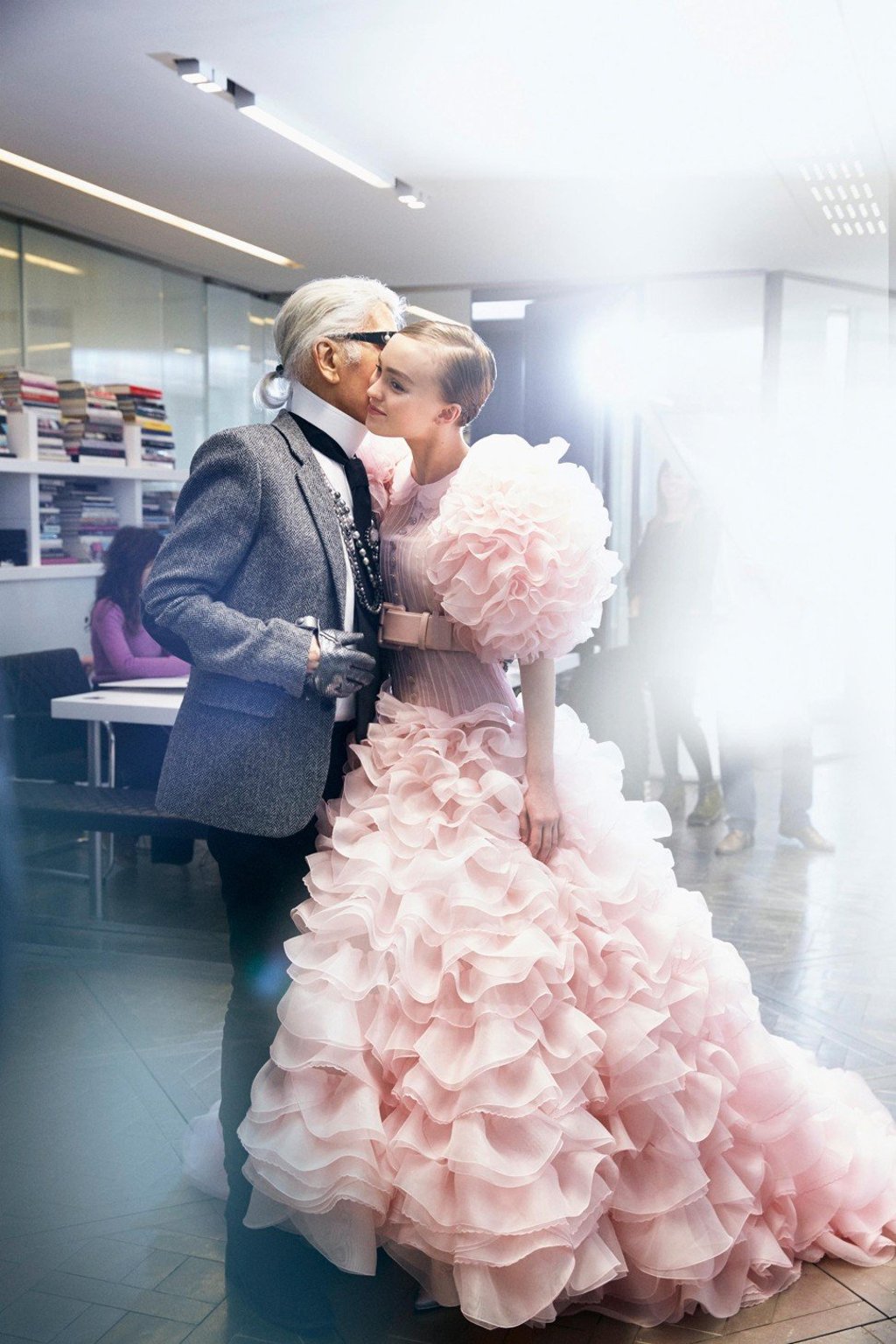 Karl Lagerfeld offers a model some tips backstage at spring/summer 2017 Haute Couture show. Photo: Benoit Peverelli