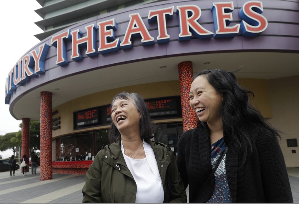 A mother and daughter are all smiles after watching “Crazy Rich Asians”, at a theatre in Daly City, California, on August 23. Photo: AP