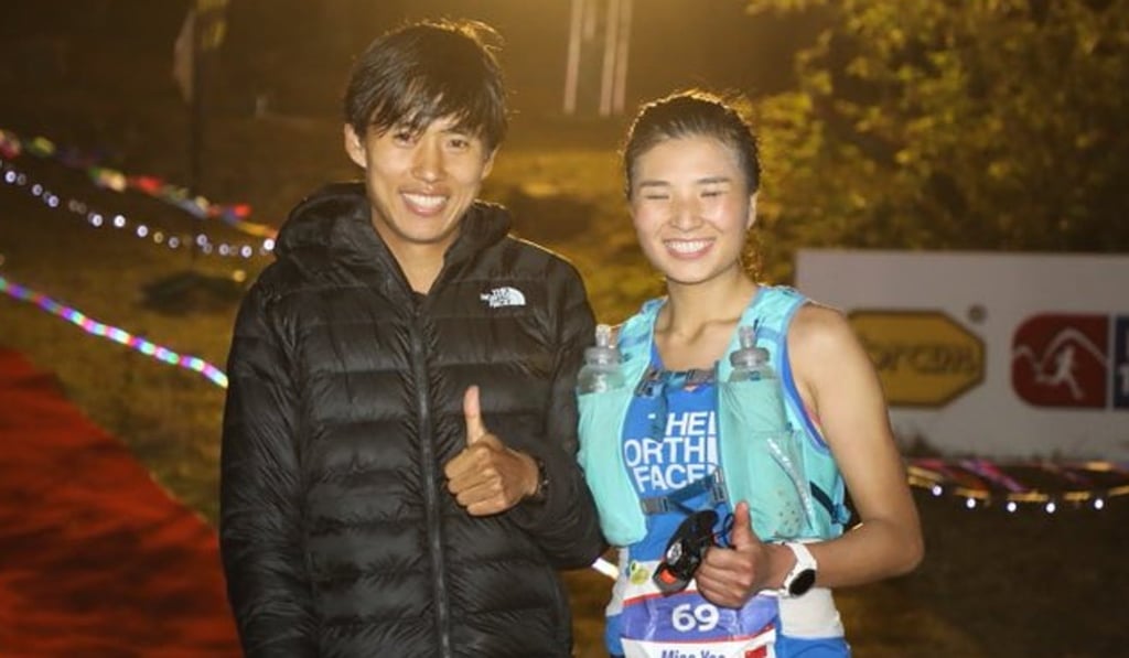 Yao Miao and Qi Min at the finish line of the HK100 after breaking the men’s and women’s records. Photo: Twitter/@irunfar