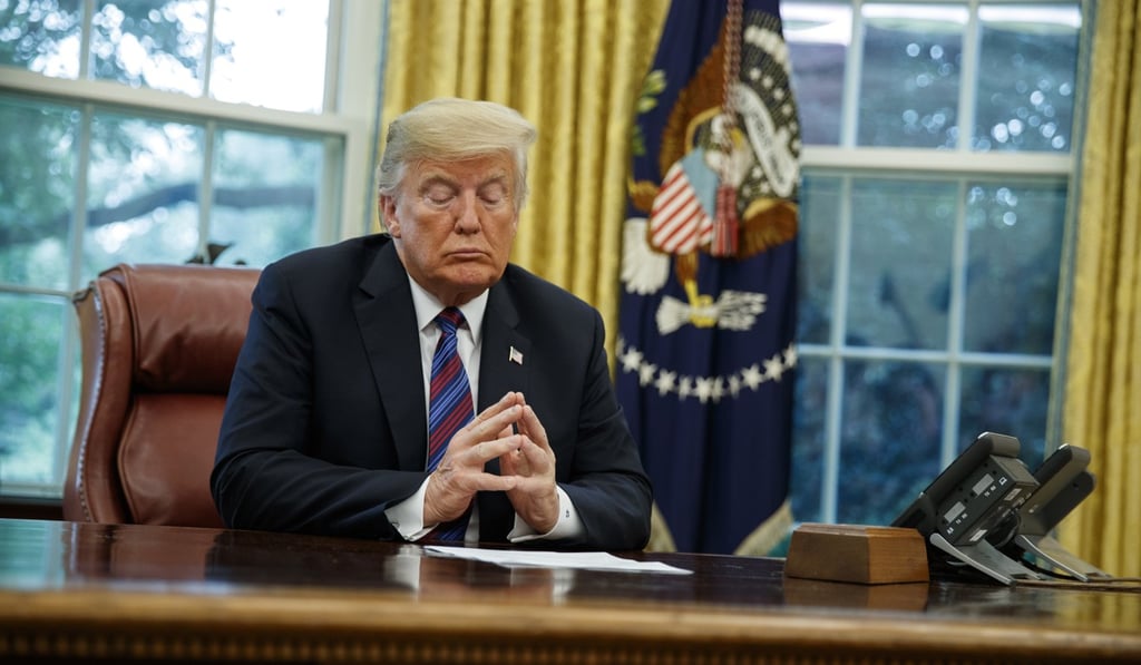 President Donald Trump on Monday in the White House, listening to Mexican President Enrique Pena Nieto speak over the telephone about a trade deal. Trump said during the session that it was ‘not the right time to talk’ with China about trade issues. Photo: AP President Donald Trump on Monday in the White House, listening to Mexican President Enrique Pena Nieto speak over the telephone about a trade deal. Trump said during the session that it was ‘not the right time to talk’ with China about trade issues. Photo: AP