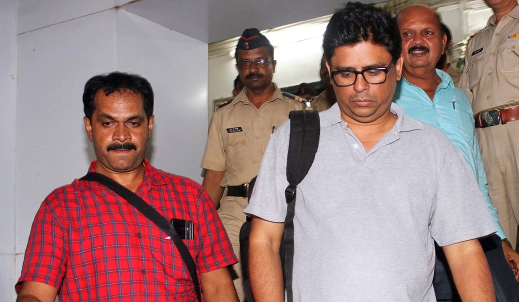 Indian activist Arun Ferreira (right) was arrested at his home on Tuesday. Photo: AFP