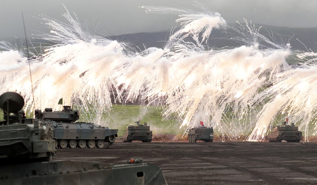 Japan Ground Self-Defence Force takes part in a live-fire exercise at the foot of Mount Fuji on August 25, 2018. Photo: Bloomberg
