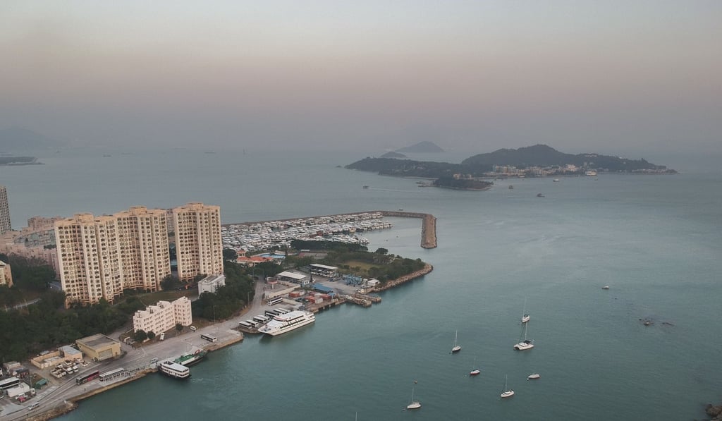 An overhead view of Discovery Bay showing residential properties and the pier. Photo: Roy Issa