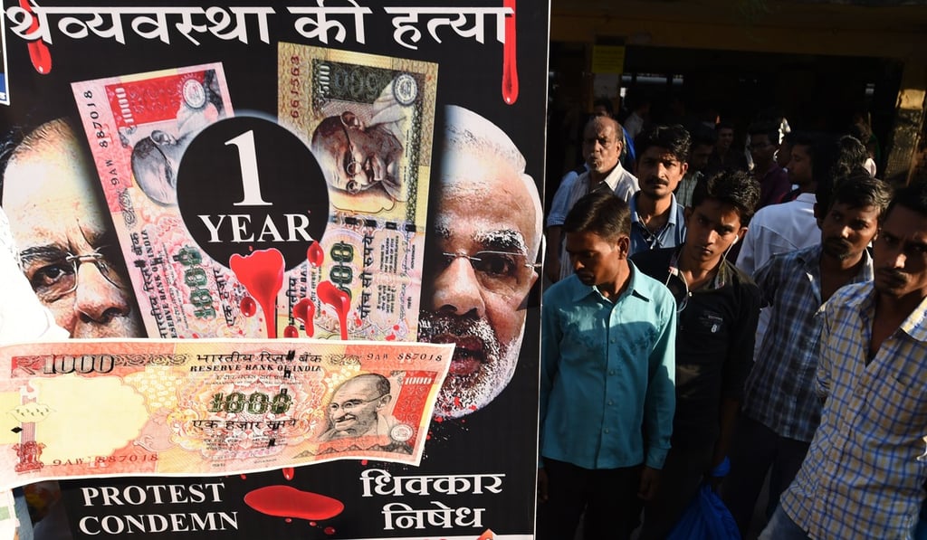 Indian Congress party supporters shout slogans and hold placards during a protest on the eve of the first anniversary of India's demonetisation scheme in Mumbai on November 7, 2017. Photo: AFP