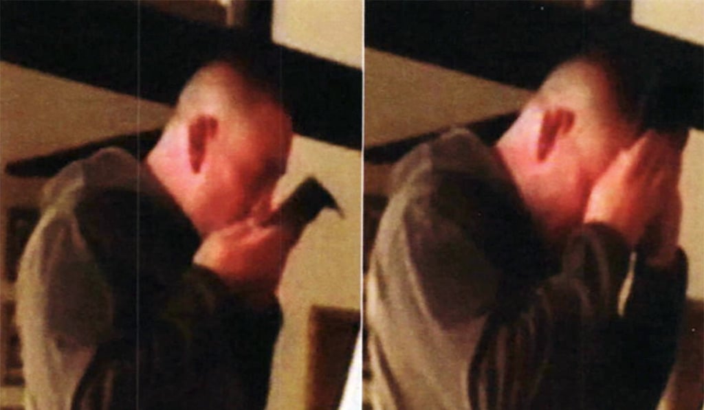 In this combination of two file images taken from FBI video and provided by the US Attorney's Office in Hawaii on Thursday, July 13, 2017, Army Sergeant Ikaika Kang kisses an Islamic State group flag, left, then puts the flag to his forehead, right, after allegedly pledging allegiance to the terror group at a house in Honolulu. Photo: AP